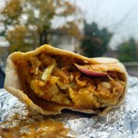 Aloo Tikki Wrap with Chickpeas at Deluxe Snacks in Rugby