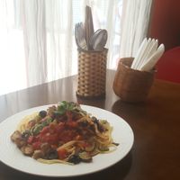 Vegan spaghetti with aubergine, mushroom, tomatoes, black olives. at Kay Vegan Bistro in Ho Chi Minh City