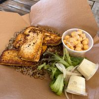 Tofu shawarma, lentil rice, chickpea salad with greens and tahini  at House of Hummus Mediterranean Cafe in Cumming