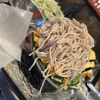 A whole bowl of veggies with noodles piled on top  at YC's Mongolian Grill in Gilbert