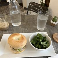 Sunflower Sausage Bagel w/ Kale Salad  at The Vegetable Hunter Cafe and Boutique Brewery in Harrisburg