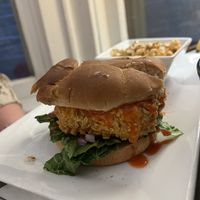 Buffalo chick’n sandwich and chick pea saladd  at The Vegetable Hunter Cafe and Boutique Brewery in Harrisburg