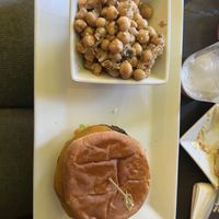 Classic burger w/ chick pea salad   at The Vegetable Hunter Cafe and Boutique Brewery in Harrisburg