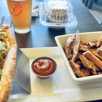 cheesesteak and sweet potato fries  at The Vegetable Hunter Cafe and Boutique Brewery in Harrisburg