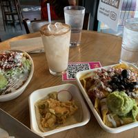 Left to right: Al pastor bowl, crispy jalapeño potato taco, and black bean nachos with horchata!  at El Borracho - Pike Place Market in Seattle