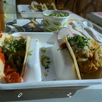 Al pastor taco and chipotle potato taco. Side of Green rice at El Borracho - Pike Place Market in Seattle