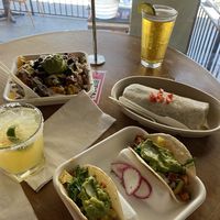 Fully loaded nachos, shrimp burrito, tofu tacos  at El Borracho - Pike Place Market in Seattle
