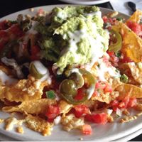 Literally heaven on a plate—the best nachos I've ever tasted at El Borracho - Pike Place Market in Seattle