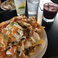 Vegan nachos, hibiscus margarita, and a vegan burrito at El Borracho - Pike Place Market in Seattle