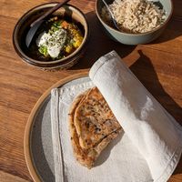 Vegetable Masala, coconut rice and sourdough spelt chapati!! at Moksha in Kaunas