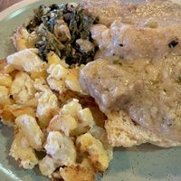 The biscuit and gravy plate so good in my mouth!   at Mac & yease  in Los Angeles