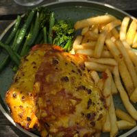 Eggplant Parmigiana with green vegies instead of salad. at Batesford Hotel in Greater Geelong City