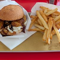 Godzilla burger and fries at Junk's Food So Good in Milan