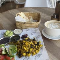 Vegan breakfast with a large cappucino   at Sababa Restaurant in Sololá