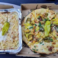 Baked alfredo pasta and zesty jalapeno and pineapple pizza at Love Amaro Pizzeria in Fontana