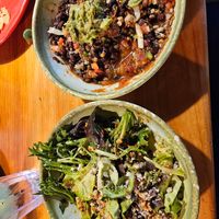 Mayan Salad (L) and black bena burrito bowl (R) at Red Mesa Grill - Traverse City in Traverse City