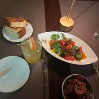 Tomato salad, Hawaiian bread, lucky god pickles and a mocktail    at Vintage Books in Honolulu
