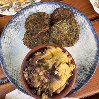 stuffed zucchini flowers, Cretan-style fava, and herb fritters   at Gürkan'ın Yeri in Ayvalık