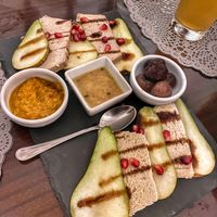  Homemade cheese plate with olives, pears and marmelades at Moon in Siracusa