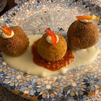 Tris di arancini  at Moon in Siracusa