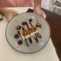Steve’s almond dessert was decadent & gorgeous   at Moon in Siracusa