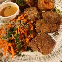 Soya medallions, roasted potatoes and carrots with tahini dressing at Moon in Siracusa