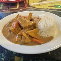 Vegan Tofu Curry and Rice  at High Grade Foods Jamaican Restaurant and Bar in Colorado Springs