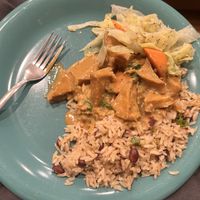 Tofu curry, steamed cabbage, peas and rice  at High Grade Foods Jamaican Restaurant and Bar in Colorado Springs