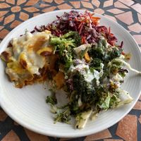 Vegan lasagna, sweet potato salad and beetroot and carrot salad with tahini dressing   at Radhey Chai Bar in Fitzroy