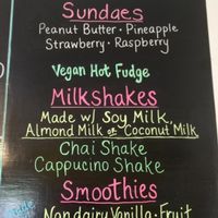 Portion of the menu (excluding the dairy-free vanilla/chocolate twist soft serve and a few others) at Ice Cream Cafe in Orleans