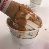 Non-dairy soft-serve twist with peanut butter sauce at Ice Cream Cafe in Orleans