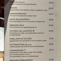 Kaart met het groene rondje met heel klein vegan zijn de vegan opties.   at Brasserie Coldenhove in Gelderland