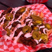 Loaded fries at Atlas Meat-Free Delicatessen in Miami