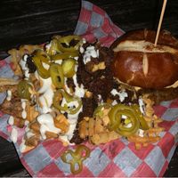 Korean Patty melt with loaded bbq fries at Atlas Meat-Free Delicatessen in Miami