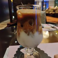 Almond milk iced latté at Caramel Lobby Lounge in Doha Municipality