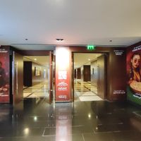 If walking from the City Center Mall, this is the hall leading to the elevators to the ground floor where Caramel Lounge is at Caramel Lobby Lounge in Doha Municipality