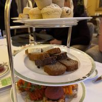 Tray of vegan scones, cakes, and finger sandwiches.  at Drawing Rooms at Merrion Hotel in Dublin