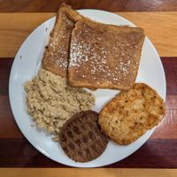 Reishi French Toast with Tofu Scramble, Sausage, and Hash Brown at The Dusted Cup in Portland