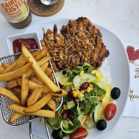 "Schnitzel" mit Pommes at Loving Hut Pension in St Kanzian