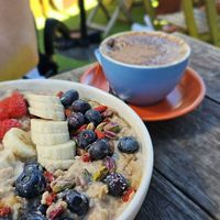 Winter porridge bowl and soy cappuccino at Combi in Elwood