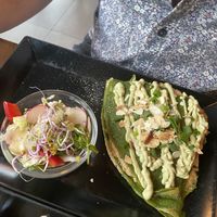 Green pancakes with cashew cream, tofu and onions  at Vege Miasto in Warsaw