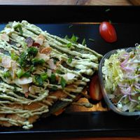Green heaven pancake with creamy filling, and side salad at Vege Miasto in Warsaw