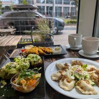 Pieroggi with cabbage and mushrooms on the right, filled potatoes with Tofu and cream cheese on the left at Vege Miasto in Warsaw