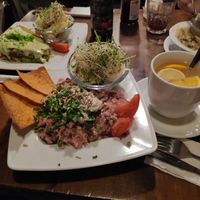 In the main place, the risotto and the reeeaaallly nice "warming hot drink", with ginger and fruits. In the back, the "green heaven", amazingly good too. at Vege Miasto in Warsaw