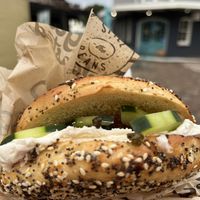 Bagel with vegan cream cheese and veg  at Spill the Beans in San Diego