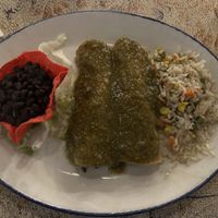 Veggie enchiladas with white rice, black beans, and no cheese.   at Barra Barra Saloon in San Diego