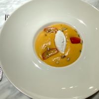 Poached peach with coconut ice-cream at Risette in Valletta