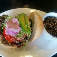 Couscous Classic Burger with extra cashew cheese and avocado. quinoa on the side at The Booch Bar in Hilo