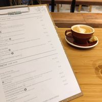 Browsing the menu with a glass of Turkish tea at Roka in Leiden