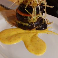 Aubergine met tomaat, basilicum  en amandelen at Lo Fai in Piacenza